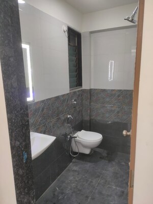 Bathroom in 1 BHK Apartment at Bindra Sateri Legacy, Andheri East – for Sale