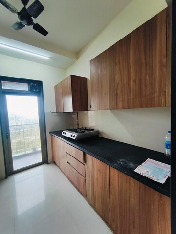 Kitchen in 1 BHK Apartment at Sonal Laxmi CHS, Ghodbunder Road – for Rent