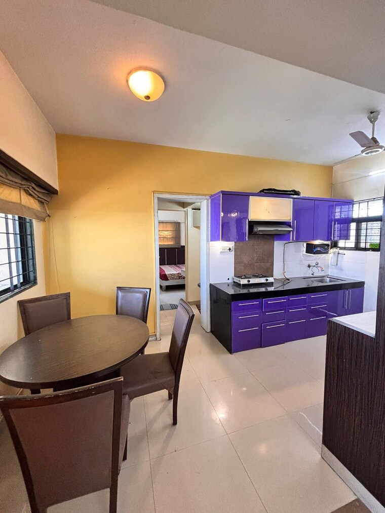 Living Room, magarpatta-city-iris 2 Bedroom 931 Sq.Ft. Apartment In Hadapsar Pune 9559382