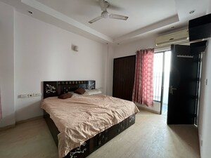 Bedroom in 3 BHK Builder Floor at Ansal Sushant Lok I, Sector 43 – for Rent