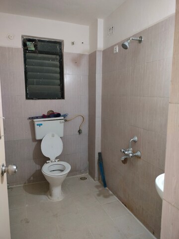 Bathroom in 2 BHK Apartment at Gurukrupa Astter, Wadgaon Sheri – for Rent