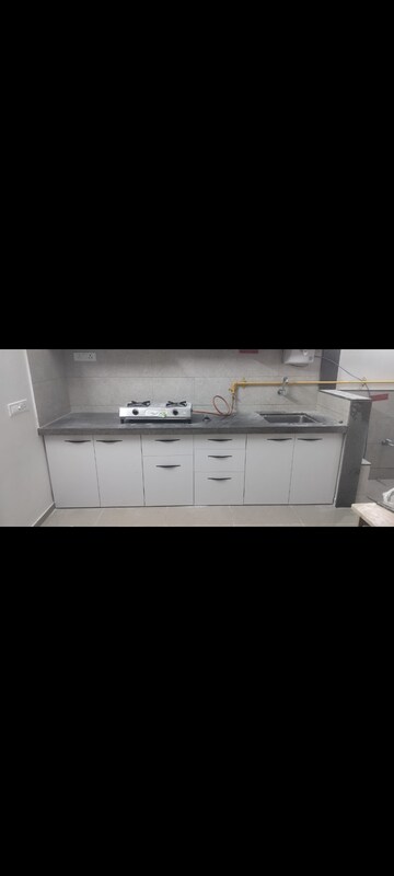 Kitchen in 3 BHK Apartment at Goyal Orchid Valley, Shela – for Rent