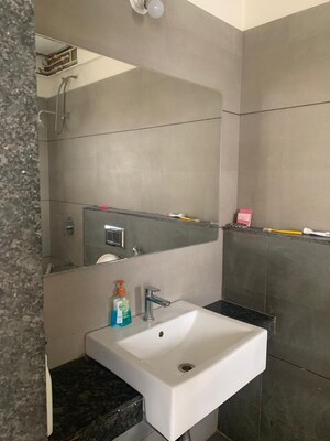 Bathroom in 3 BHK Apartment at Rohan Madhuban, Bavdhan – for Rent