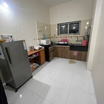 Kitchen in 2 BHK Apartment at Vikram Nandadeep, Senapati Bapat Road – for Rent