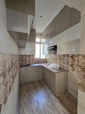 Kitchen in 3 BHK Apartment at Amrapali Golf Homes, Sector 4 Greater Noida – for Rent