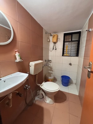 Master Bedroom in 2 BHK Apartment at Satellite Garden, Goregaon East – for Rent