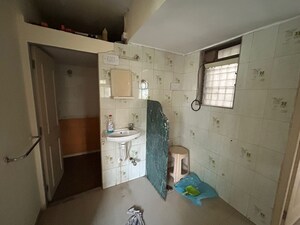 Kitchen in 2 BHK Apartment at Godrej Emerald, Ghodbunder Road – for Rent