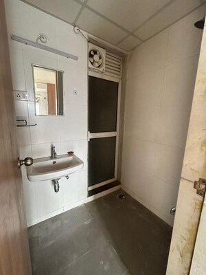 Bathroom in 3 BHK Apartment at Godrej Emerald, Ghodbunder Road – for Rent