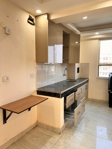 Kitchen in 1 RK Apartment at Kingson ARV Arcade, Raj Nagar Extension – for Sale