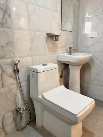 Bathroom in 1 RK Apartment at Kingson ARV Arcade, Raj Nagar Extension – for Sale