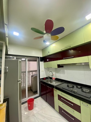 Kitchen in 2 BHK Apartment at Paranjape Schemes Royal Court, Andheri East – for Rent