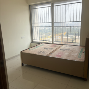 Bedroom in 1 BHK Apartment at Kolte Patil Life Republic Oro Avenue, Kasarsai – for Rent