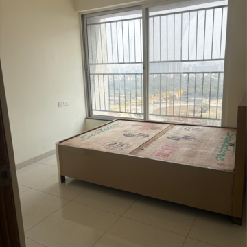 Bedroom in 1 BHK Apartment at Kolte Patil Life Republic Oro Avenue, Kasarsai – for Rent
