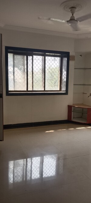 Room in 2 BHK Apartment at Mangal Geeta Apartment, Andheri West – for Rent