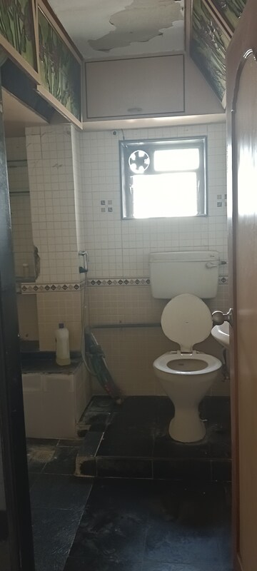 Bathroom in 2 BHK Apartment at Mangal Geeta Apartment, Andheri West – for Rent