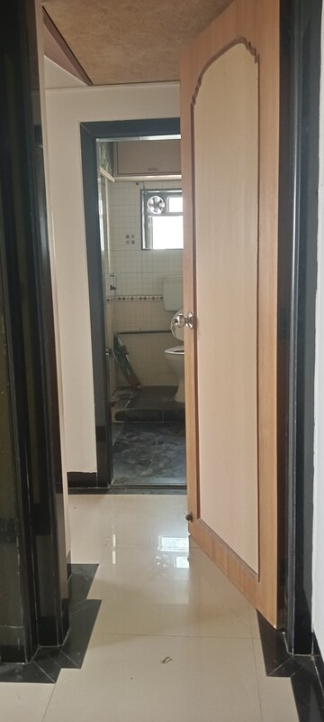 Building Lobby in 2 BHK Apartment at Mangal Geeta Apartment, Andheri West – for Rent