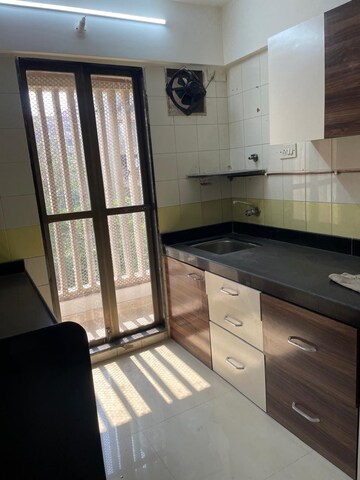 Kitchen in 2 BHK Apartment at Sadguru Complex I, Goregaon East – for Rent
