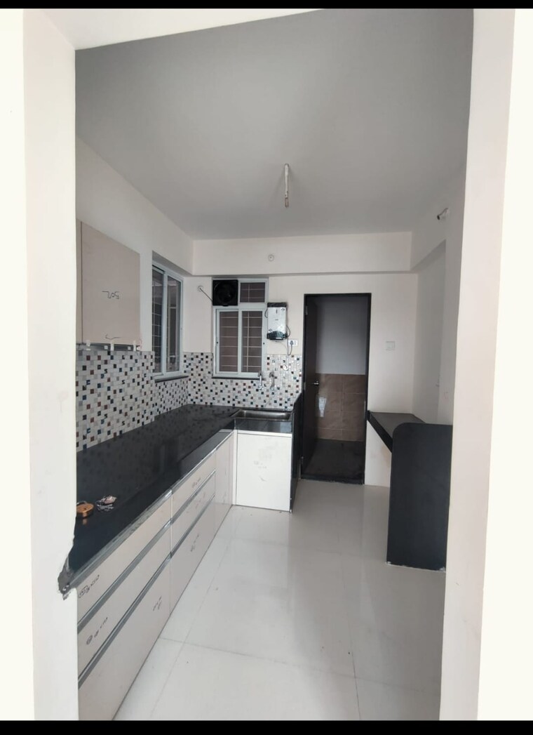 Kitchen, j-n-adiamville 2 Bedroom 701 Sq.Ft. Apartment In Tathawade Pune 9560002