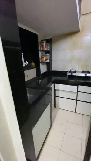 Kitchen in 1 BHK Apartment at Anand Bhavan Vile Parle West, Vile Parle West – for Rent