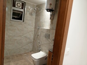 Bathroom in 3 BHK Builder Floor at Ansal Sushant Lok I, Sector 43 – for Rent