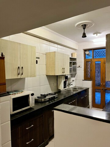 Kitchen in 3 BHK Builder Floor at Ansal Sushant Lok I, Sector 43 – for Rent
