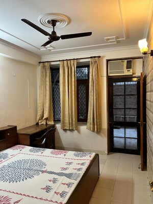 Bedroom in 3 BHK Builder Floor at Ansal Sushant Lok I, Sector 43 – for Rent