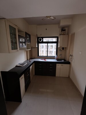 Kitchen in 1 BHK Apartment at Dheeraj Hill View Tower, Borivali East – for Rent