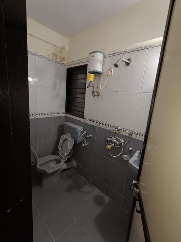 Bathroom in 1 BHK Apartment at Dheeraj Hill View Tower, Borivali East – for Rent