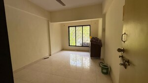 Room in 2 BHK Apartment at Ratna Samuha CHS, Andheri West – for Rent