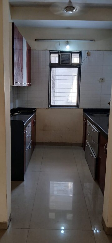 Kitchen in 2 BHK Apartment at Ratna Samuha CHS, Andheri West – for Rent