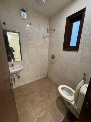 Bathroom in 3 BHK Builder Floor at Chattarpur – for Rent
