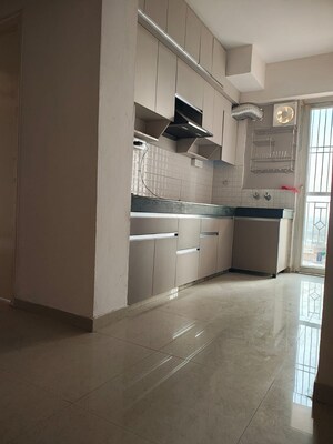 Kitchen in 2 BHK Apartment at Shree Vardhman Green Court, Sector 90 – for Rent