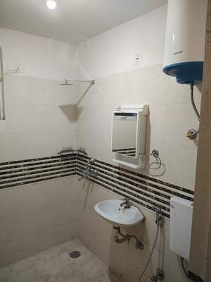 Bathroom in 2 BHK Apartment at Shree Vardhman Green Court, Sector 90 – for Rent