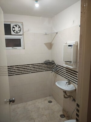 Bathroom in 2 BHK Apartment at Shree Vardhman Green Court, Sector 90 – for Rent