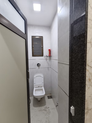 Bathroom in 1 BHK Apartment at Siddharth Nagar CHS, Borivali East – for Rent