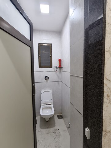 Bathroom in 1 BHK Apartment at Siddharth Nagar CHS, Borivali East – for Rent