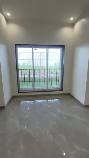 Living Room in 2 BHK Apartment at Rajlaxmi Nakshatra Auris, Nalasopara West – for Sale