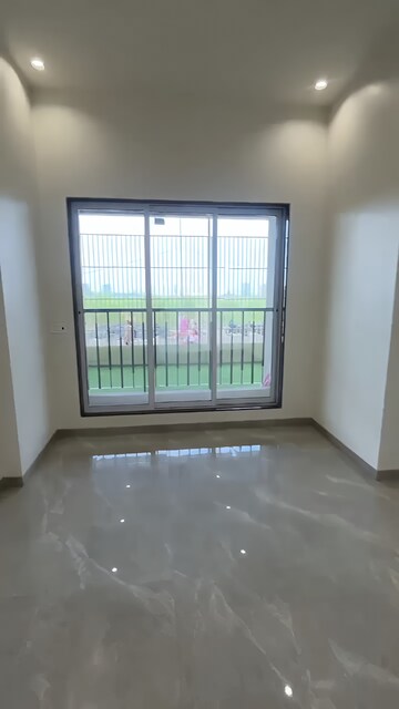 Living Room in 2 BHK Apartment at Rajlaxmi Nakshatra Auris, Nalasopara West – for Sale