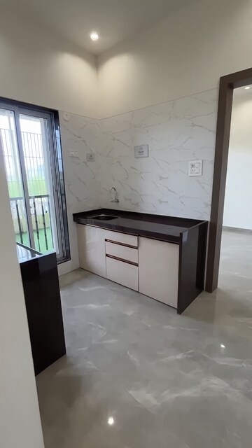 Kitchen in 2 BHK Apartment at Rajlaxmi Nakshatra Auris, Nalasopara West – for Sale