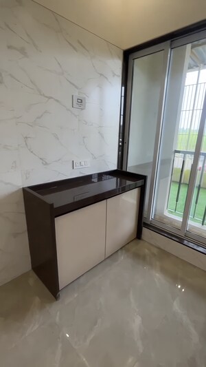 Kitchen in 2 BHK Apartment at Rajlaxmi Nakshatra Auris, Nalasopara West – for Sale