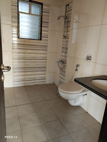 Bathroom in 3 BHK Apartment at Paranjape Schemes Forest Trails, Bhugaon – for Sale