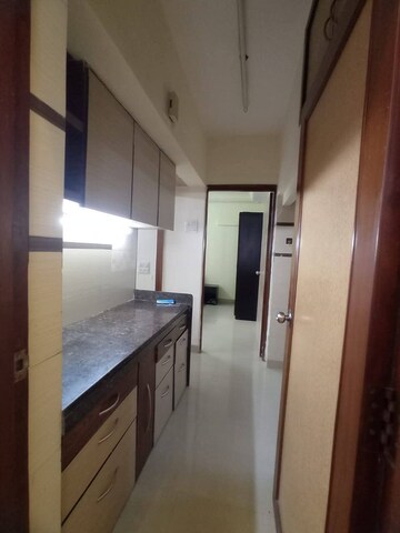Kitchen in 1.5 BHK Apartment at Kanakia Park Apartment, Kandivali East – for Rent