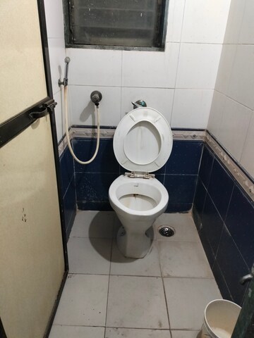 Bathroom in 1 BHK Apartment at Prakruti Park, Brahmand – for Rent