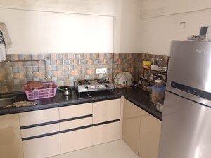 Kitchen in 2.5 BHK Apartment at Abhinav Pebbles Urbania, Bavdhan – for Sale