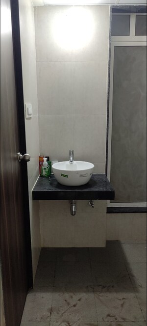 Bathroom in 1 BHK Apartment at JP North Elara, Mira Road – for Rent