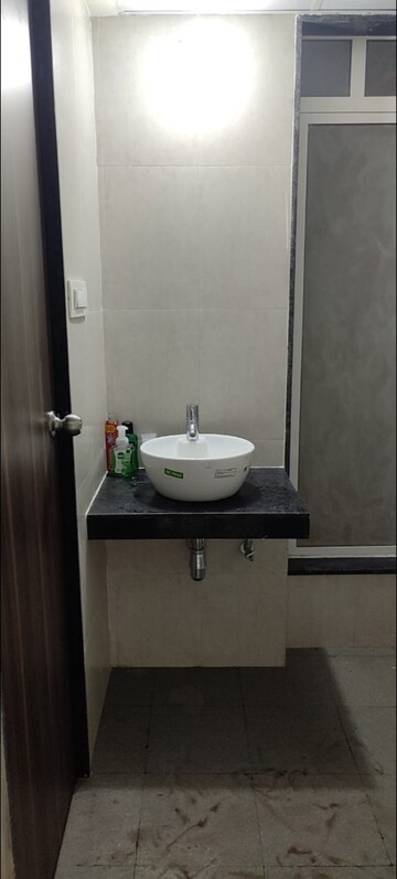 Bathroom in 1 BHK Apartment at JP North Elara, Mira Road – for Rent