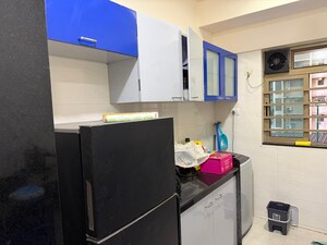Kitchen in 2 BHK Apartment at Sheth Vasant Oasis, Andheri East – for Rent