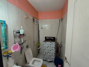 Bathroom in 2 BHK Apartment at Puranik Hometown, Ghodbunder Road – for Sale
