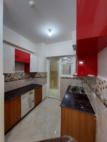 Kitchen in 3 BHK Apartment at Gaurs Siddhartham, Siddharth Vihar – for Sale