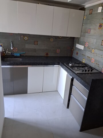 Kitchen in 2 BHK Apartment at Shubh Tirupati Apartment, Andheri West – for Sale